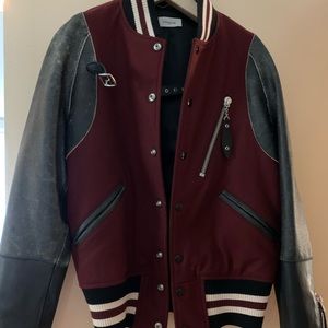Varsity jacket crafted in wool with leather.